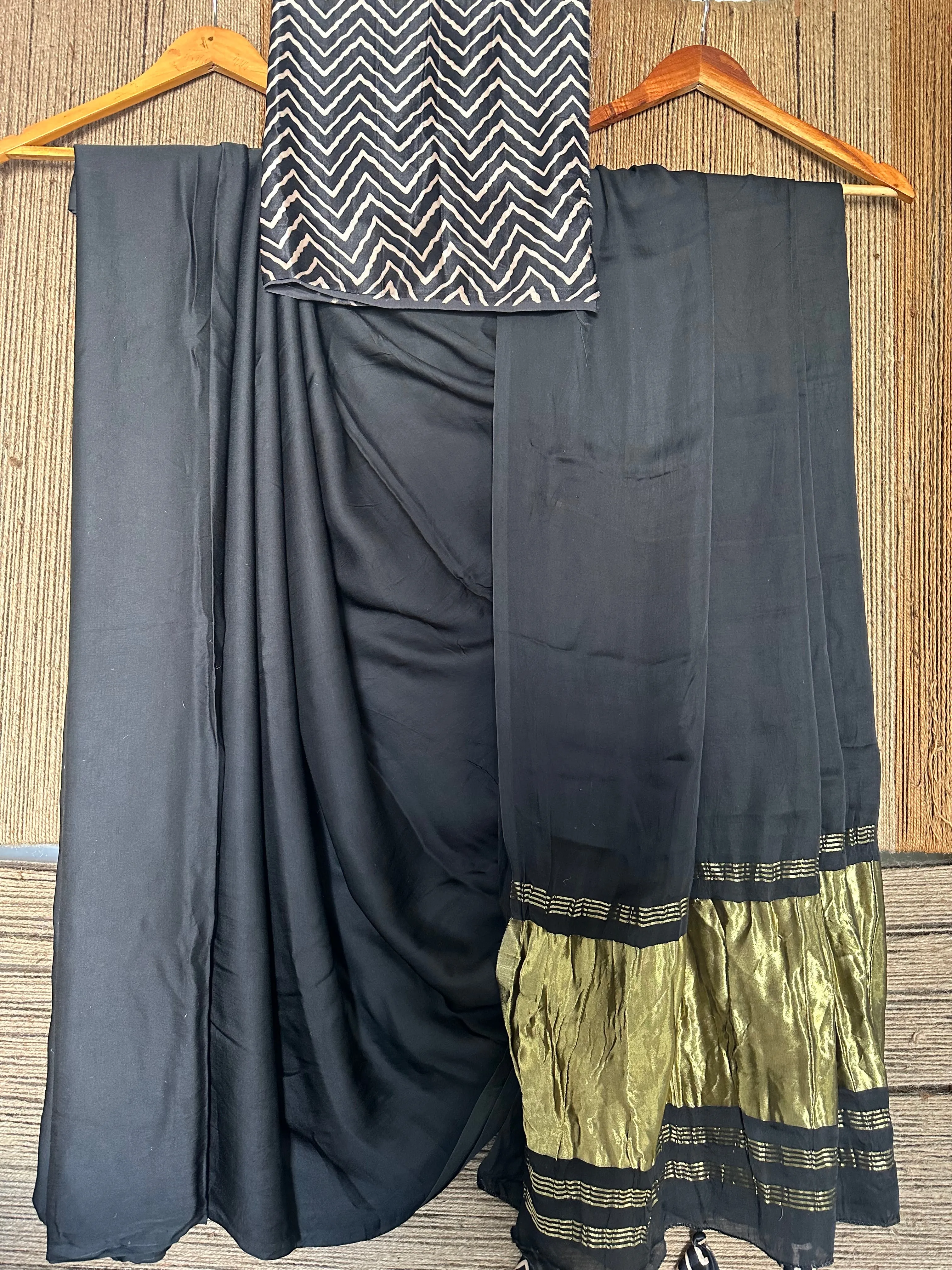 GLAMOROUS BLACK SOLID MODAL SILK SARI WITH ZARI BORDER