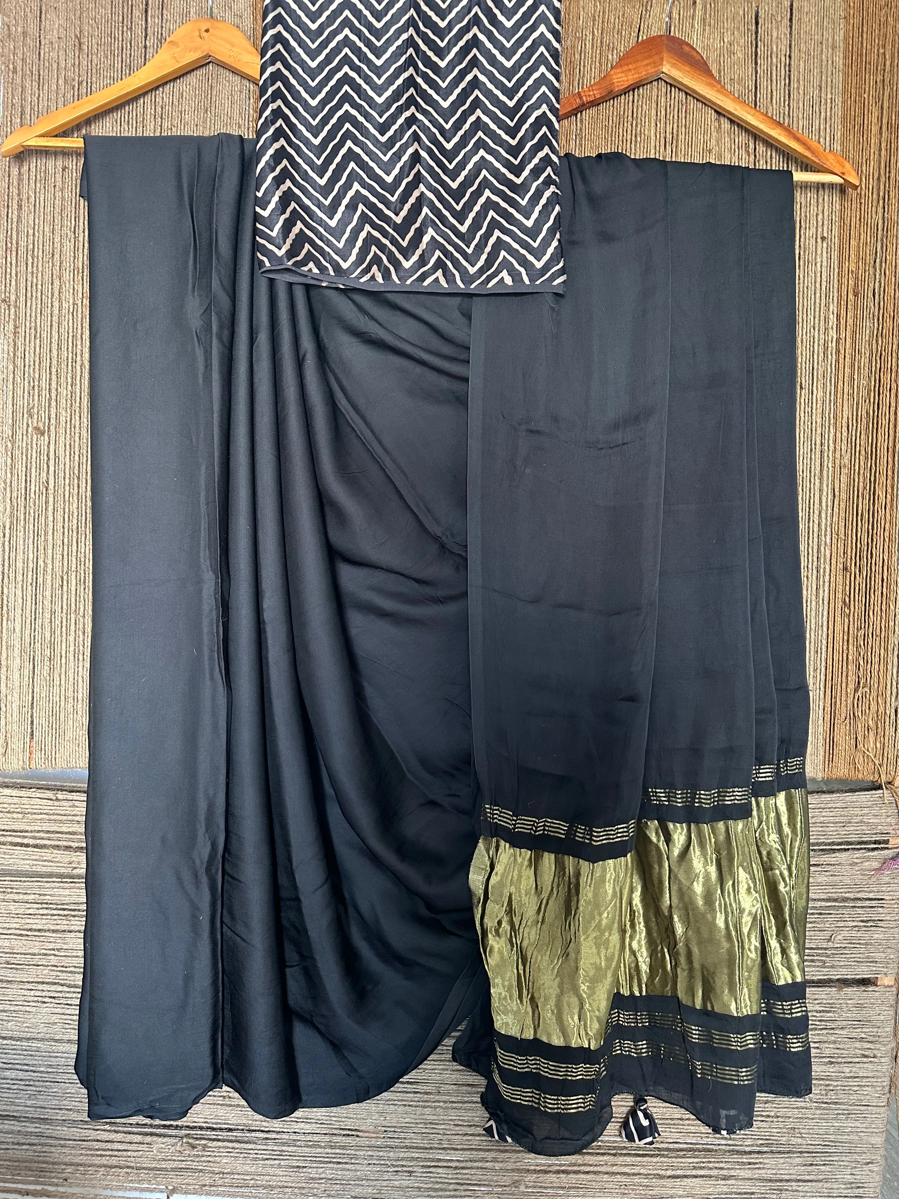 GLAMOROUS BLACK SOLID MODAL SILK SARI WITH ZARI BORDER